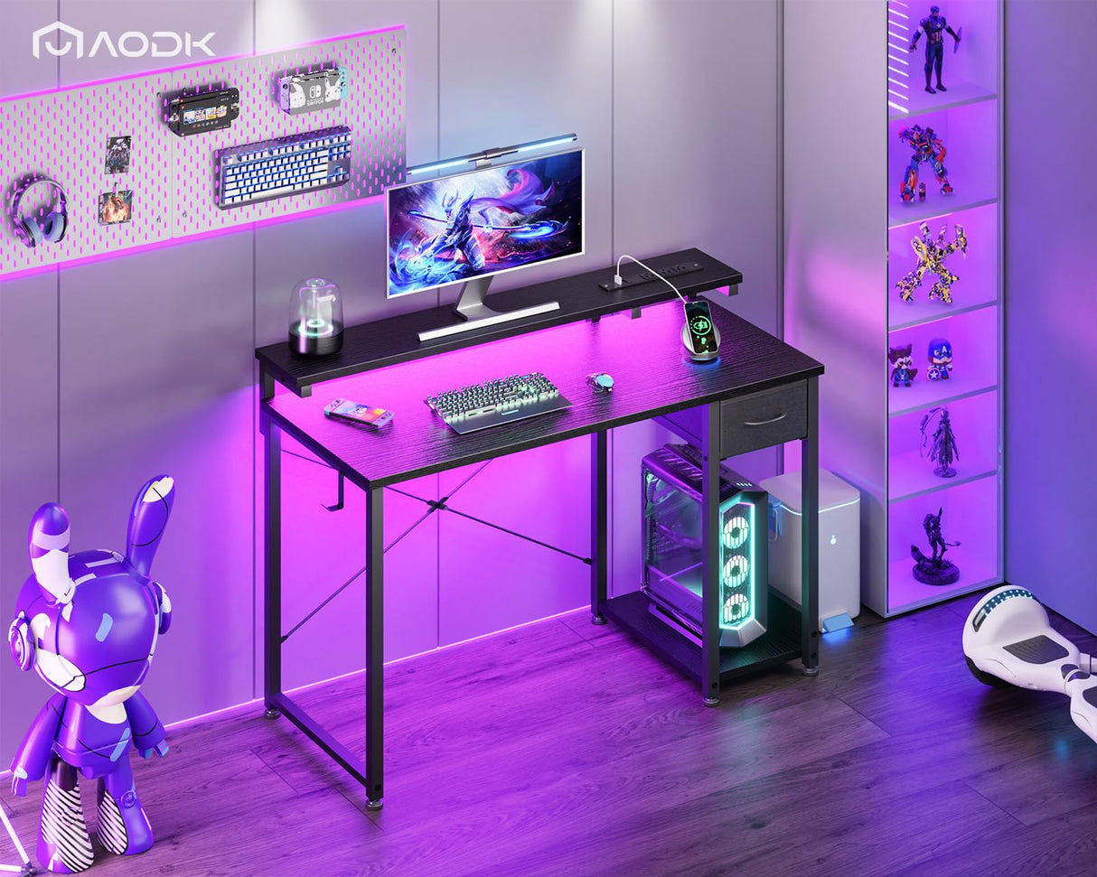 AODK Gaming Desk with LED Lights & Power Outlet, 40 Inch Computer Desk with Drawer, Reversible Desk with Adjustable Monitor Shelf & Headphone Hook for Home Office, Black AODK