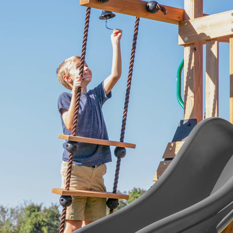 Backyard Discovery Endeavor All Cedar Wood Swing Set Playset with Gray Wave Slide for Backyard with Large Clubhouse Rope Ladder Rock Climbing Wall Wave Slide 2 Belt Swings and 1 Web Swing Gift Backyard Discovery