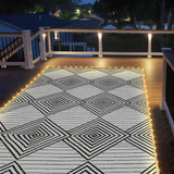 6x9ft Waterproof Outdoor Rug with LED Lights, Foldable Reversible Plastic Straw Mat for Patio RV Camping Picnic Balcony Beach Deck Indoor Outdoor Carpet, Black&White DiiKoo