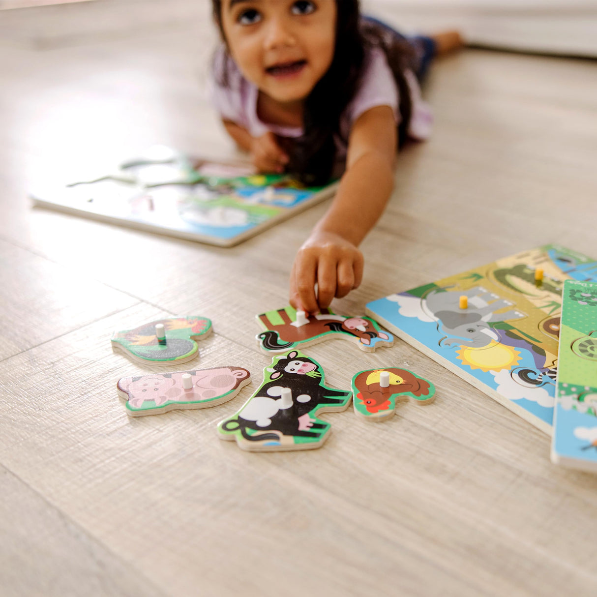 Melissa & Doug Wooden Peg Puzzle 4-Pack for Toddler and Preschool Boys and Girls – Vehicles, Farm, Safari, Pets Melissa & Doug