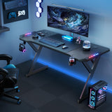 HLDIRECT 63 INCH Gaming Desk with LED Lights, Home Office Gamer Desk, Ergonomic Computer Table with Large Carbon Fiber Desktop, Office Workstation with Mouse Pad, Cup Holder & Headphone Hook, Black HLDIRECT