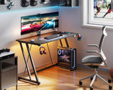 MOTPK Gaming Desk with LED Lights & Power Outlet, Computer Desk 47inch for Small Space, Cheap Gaming Table with Carbon Fiber Texture, Kids Desk Gift for Boys Men, Black MOTPK