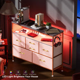 YILQQPER Dresser for Bedroom TV Stand with Power Outlets and LED Light, 6 Drawers Dresser with Side Pockets & Hooks, Wide Dresser with Shelves for 45" TV, Fabric Chest of Drawers with PU Finish, Pink YILQQPER