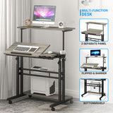 Mobile Standing Desk, Adjustable Rolling Computer Desk with 3 Desktops, Portable Laptop Table with Cup Holder, Home Office Laptop Workstation on Lockable Wheels, Grey Oak Panta