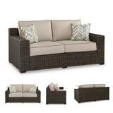 Signature Design by Ashley Coastline Bay Casual Weather Resistant Outdoor Loveseat with Cushion and 2 Throw Pillows, Beige & Dark Brown Signature Design by Ashley