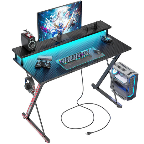 TIQLAB Gaming Desk with Power Outlets & LED 40 Inch Ergonomic Computer Carbon Fiber Surface Gamer Desk, Large Monitor Stand, Headphone Hook, PC Workstation for Bedroom, Black Desk TIQLAB