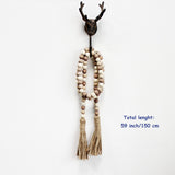 CVHOMEDECO. Wood Beads Garland with Tassels Farmhouse Rustic Wooden Prayer Bead String Wall Hanging Accent for Home Festival Decor. Mix Distressed CVHOMEDECO.