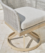 Signature Design by Ashley Seton Creek Cottage Weather Resistant Outdoor Swivel Dining Chair with Cushion, Set of 2, Light Brown & Light Gray Signature Design by Ashley