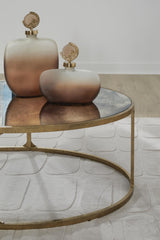 Signature Design by Ashley Korajane Oval Coffee Table with Tempered Glass Top, Faux Marble Finish, Steel Frame, 48" W x 27.38" D x 17.5" H, Antique Gold Signature Design by Ashley
