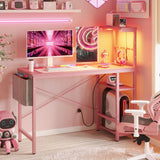 Bestier Pink Gaming Desk with Power Outlets, 44 Inch Led Gamer Desk with 4 Tiers Reversible Shelves, Pink Computer Desk with Headset Hook & Side Storage Bag for Bedroom (Pink 3D Carbon Fiber) Bestier