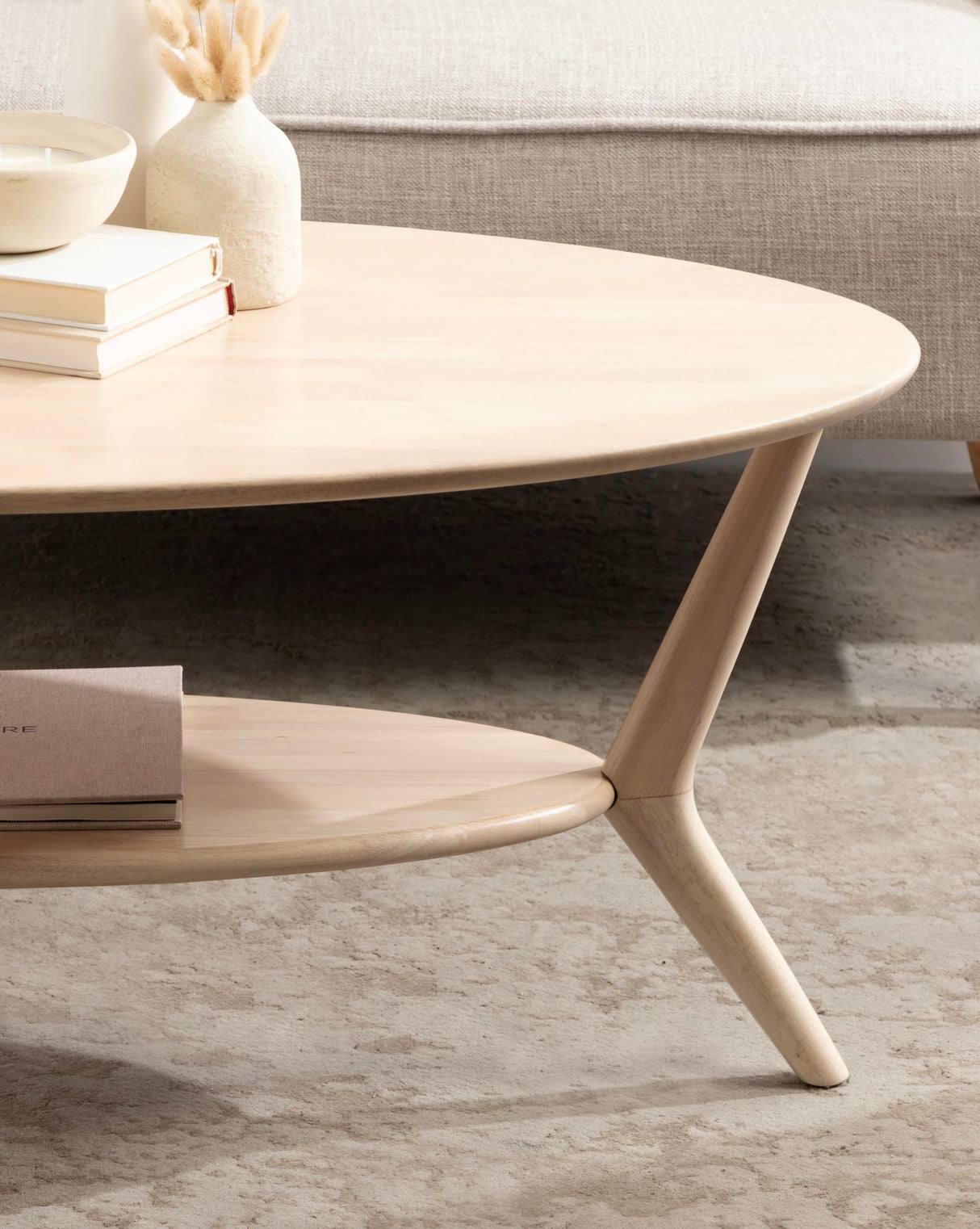 Kate and Laurel Nylah Oval Wooden Coffee Table; 48 x 26 x 18; Light Natural; Transitional Tiered Living Room Table with Solid Wood Construction and Sculptured Dowel Legs Kate and Laurel