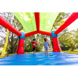 Bounceland Inflatable Party Castle Bounce House Bouncer, 16 ft L x 13 ft W x 10.3 ft H, Basketball Hoop, Removable Sun Roof, UL Strong Blower included, Fun Slide and Bounce Area, Castle Theme for Kids Bounceland