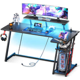 MOTPK Gaming Desk with LED Lights & Power Outlets, 55 Inch L Shaped Gaming Computer Desk with Storage Shelf, Gamer Desk with Monitor Stand, PC Gaming Table with Carbon Fiber Texture, Black MOTPK