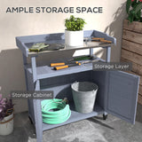 Outsunny Outdoor Wooden Potting Bench Table, Garden Workstation with Storage Cabinet, Aluminum Table Top, Rubber Wheels for Backyard, Patio, Balcony, Gray Outsunny