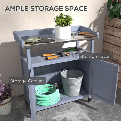 Outsunny Outdoor Wooden Potting Bench Table, Garden Workstation with Storage Cabinet, Aluminum Table Top, Rubber Wheels for Backyard, Patio, Balcony, Gray Outsunny