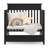 Storkcraft Petal 4-in-1 Convertible Mini Crib (Black) – GREENGUARD Gold Certified, Converts to Daybed and Twin-Size Bed, Includes Bonus 2.75-inch Mini Crib Mattress Storkcraft