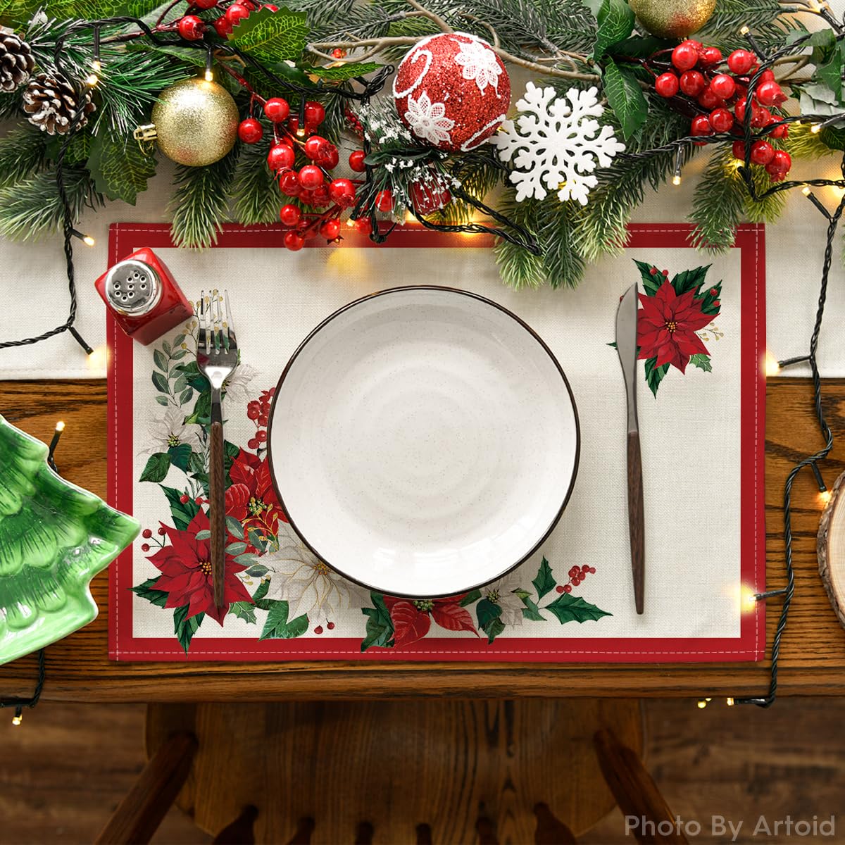 Artoid Mode Beige Leaves Poinsettia Christmas Placemats Set of 4, 12x18 Inch Seasonal Winter Table Mats for Party Kitchen Dining Decoration Artoid Mode