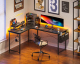 Casaottima L Shaped Computer Desk with Storage Bag, 57.5 Inch Reversible Gaming Desk, Home Office Corner Desk with Monitor Shelf, Space-Saving Writing Workstation Desk, Easy to Assemble, Black Casaottima