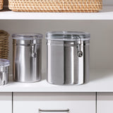 Oggi Stainless Steel Kitchen Canister 152 fl oz - Airtight Clamp Lid, Clear See-Thru Top - Ideal for Kitchen Storage, Food Storage, Pantry Storage. Jumbo Size 8" x 8". Oggi