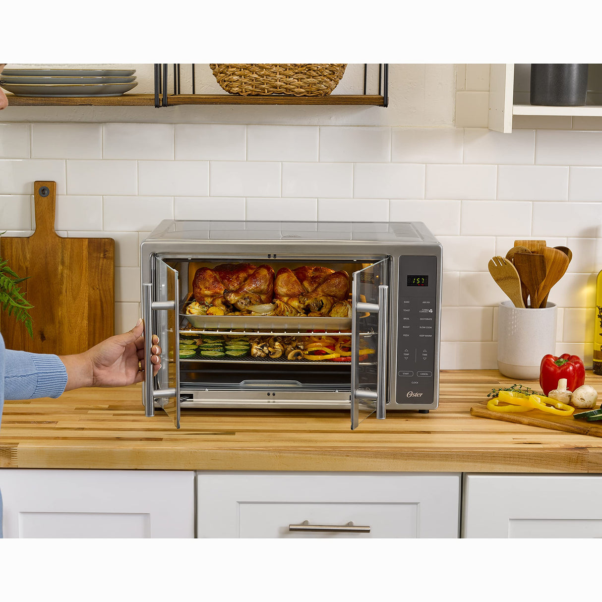 Oster Air Fryer Oven, 10-in-1 Countertop Toaster, Large Enough for 2 Pizzas, Stainless Steel French Doors, XL Sized Oster