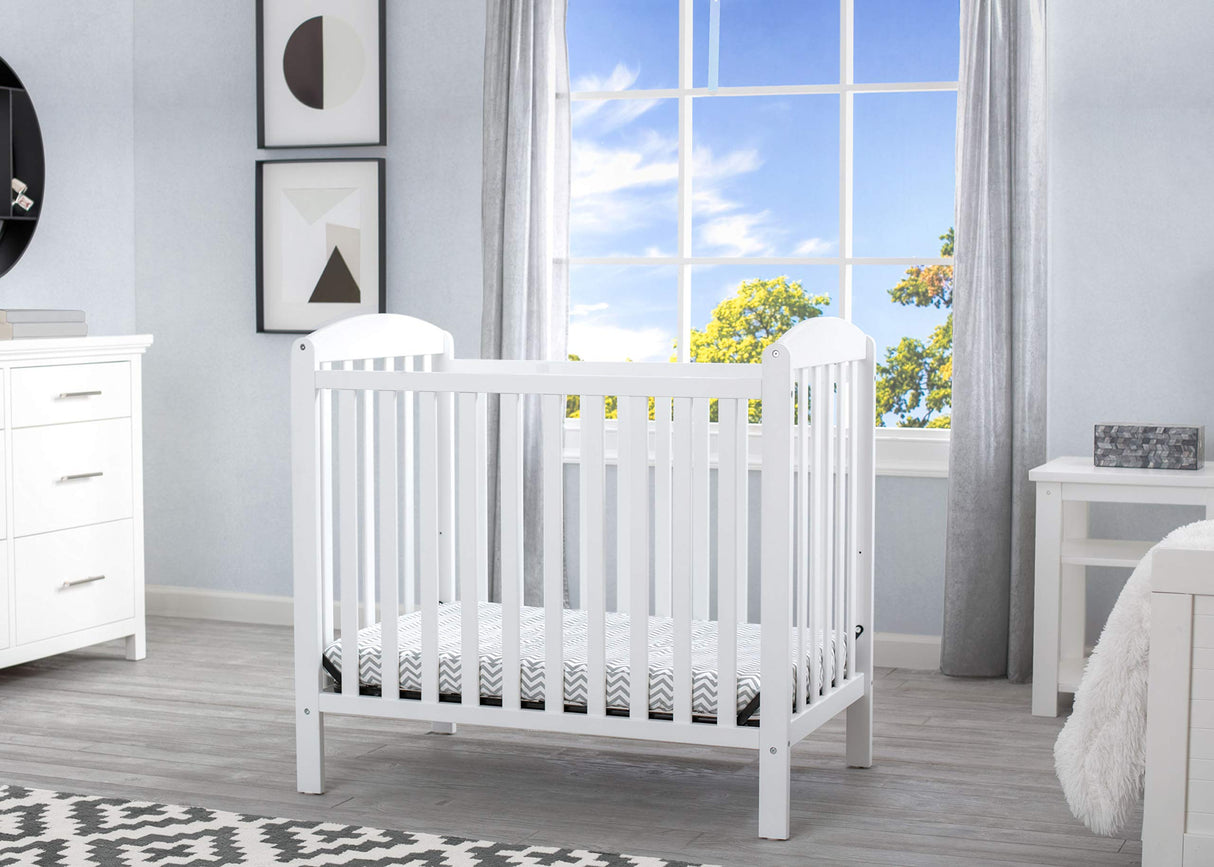 Delta Children Emery Mini Convertible Baby Crib with 2.75-inch Mattress, Bianca White Delta Children