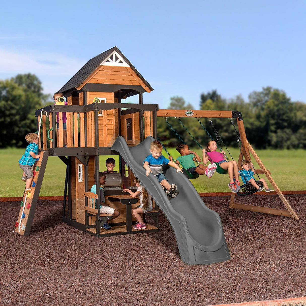 Backyard Discovery Canyon Creek All Cedar Wood Swing Set w/Grey Wave Slide, Playhouse w/Grill, Plastic Food, Picnic Area, Steering Wheel, Two Belt Swings, Rock Climbing Wall, Balcony, Deck, Web Swing Backyard Discovery