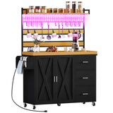 DWVO 53 inch Bakers Rack with Power Outlet and Storage, Farmhouse Coffee Bar Cabinet on Wheels, Microwave Stand Kitchen Cabinet with Hutch, LED Lights, Wine Glass Holder and 14 Hooks, Black DWVO
