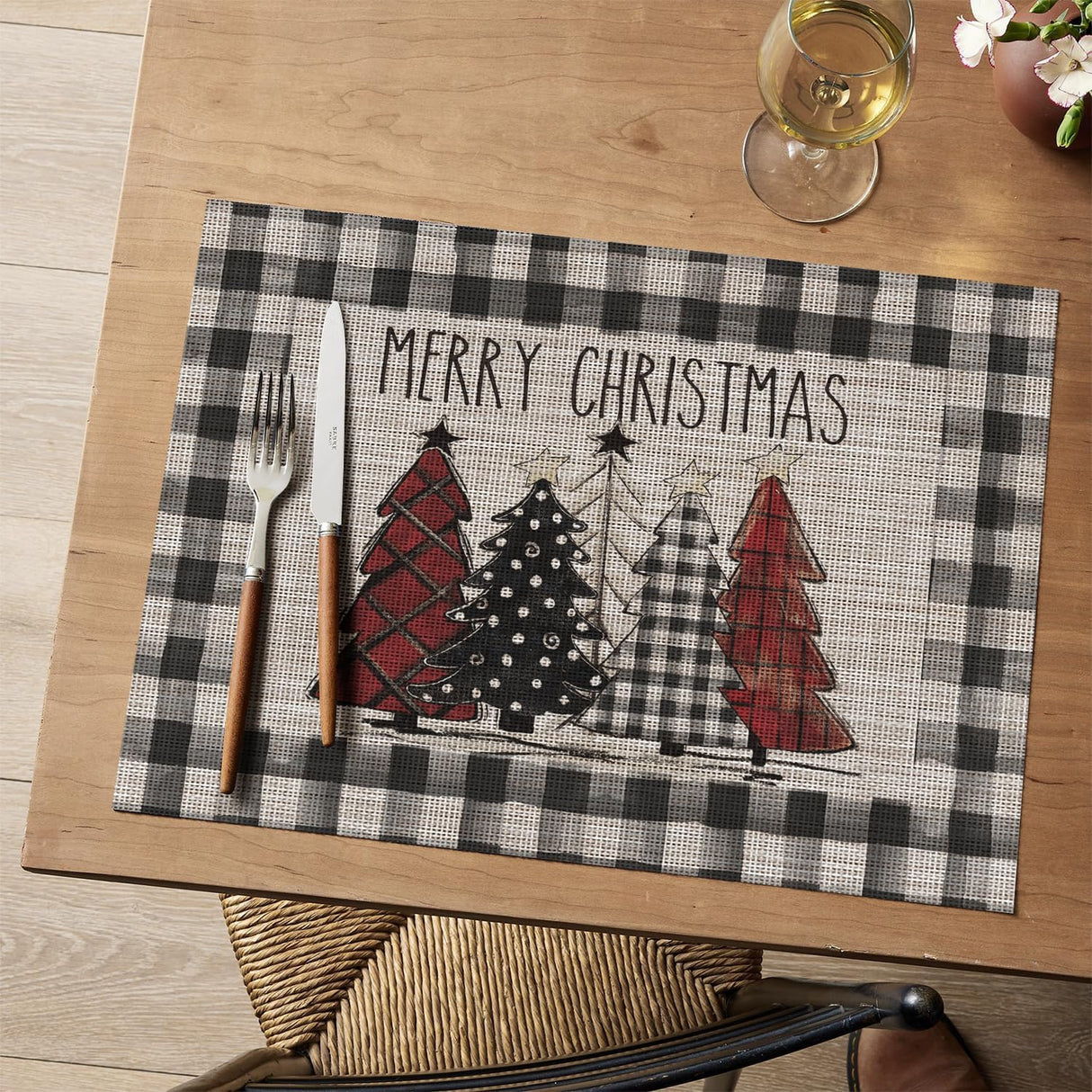 Artoid Mode Merry Christmas Trees Vinyl Placemats Set of 4, 12x18 Inch Black Buffalo Plaid Washable Heat Resistant Plastic Woven Table Mats for Party Dining Decor Artoid Mode