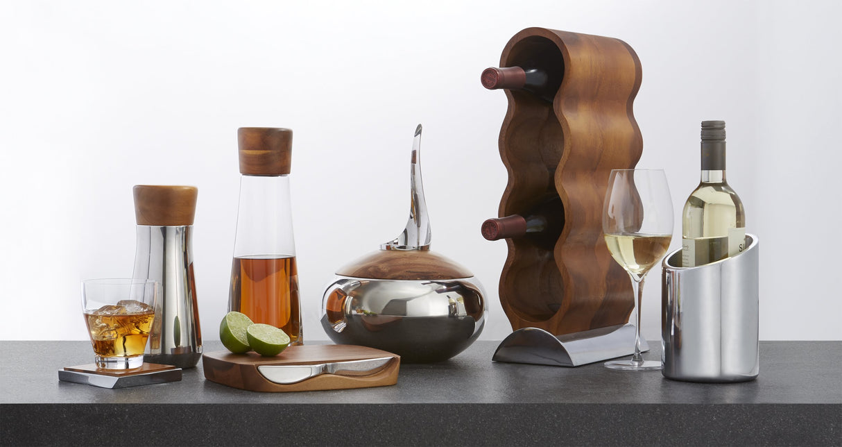 Nambe Curvo Wine Rack | Wooden Wine Rack for Countertop | Wine Bottle Stand for Home Décor | Made of Acacia Wood and Silver Alloy | Designed by Steve Cozzolino Nambe