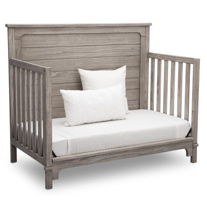 Delta Children Simmons Kids Slumbertime Monterey 4-in-1 Convertible Crib, Rustic White