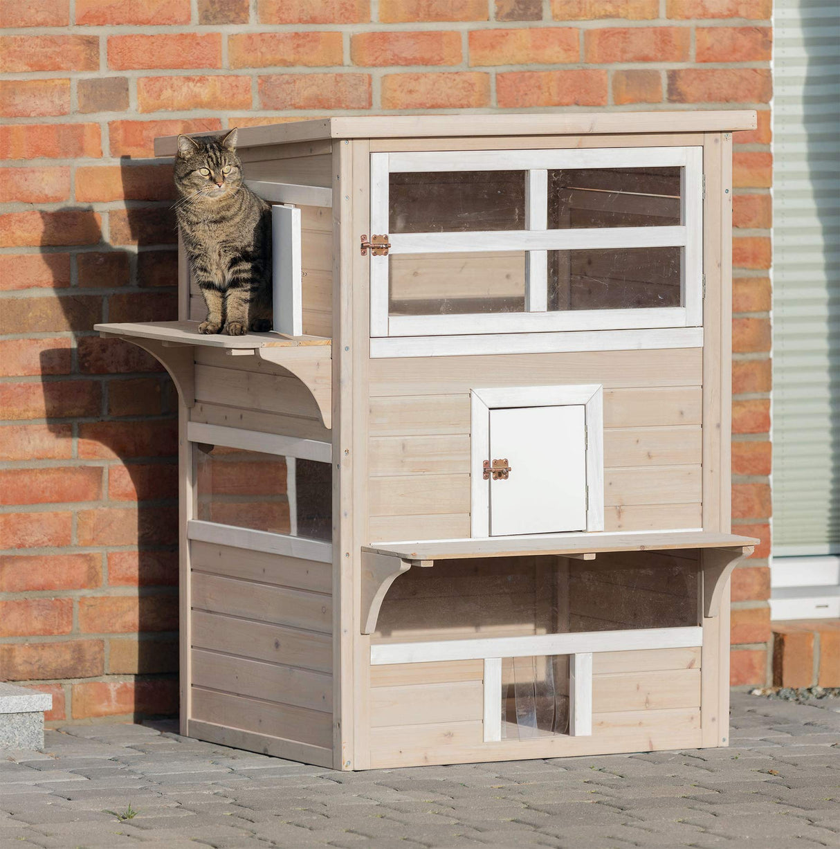 TRIXIE Outdoor Cat House, Weatherproof 3-Story Cat House with Multiple Levels, Doors & Windows with Latches, Outdoor Shelter for Cats, Brown/White Fir Wood TRIXIE