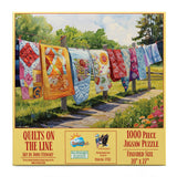 SUNSOUT INC - Quilts on The Line - 1000 pc Jigsaw Puzzle by Artist: John Stewart - Finished Size 20" x 27" - MPN# 77112 SunsOut
