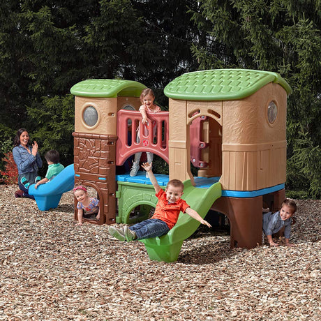 Step2 Clubhouse Climber, Kids Outdoor Playset, Backyard Playground Set, 2 Slides, Climbing Wall, Elevated Playhouse, Outside Jungle Gym, For Toddlers 2-6 Years Old Step2