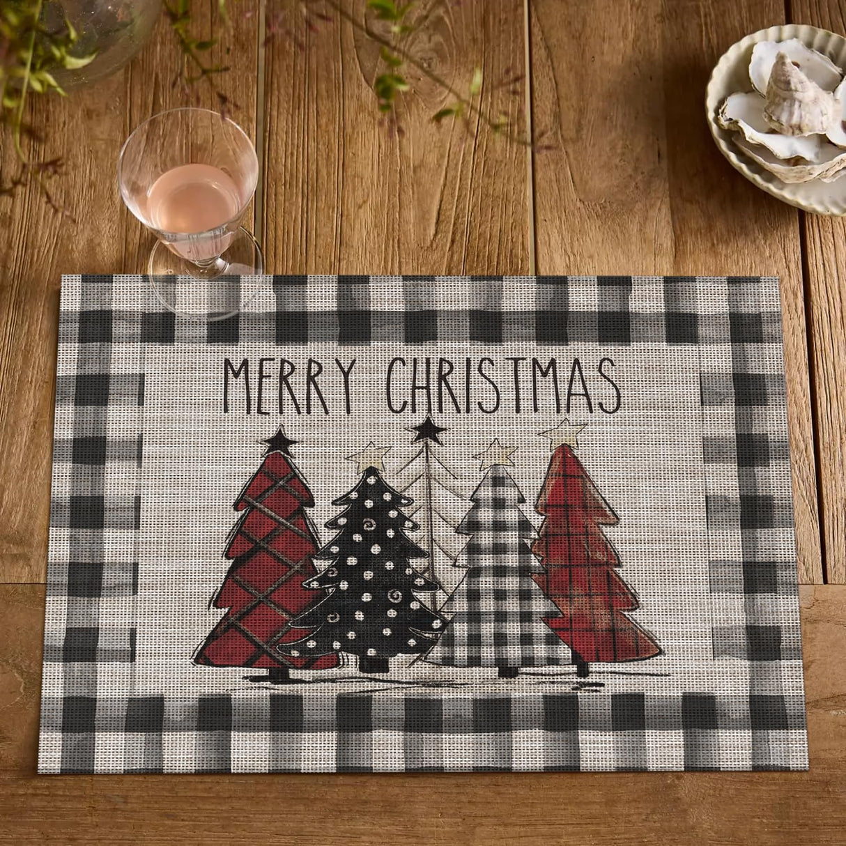 Artoid Mode Merry Christmas Trees Vinyl Placemats Set of 4, 12x18 Inch Black Buffalo Plaid Washable Heat Resistant Plastic Woven Table Mats for Party Dining Decor Artoid Mode