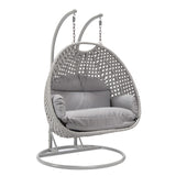 LeisureMod Light Gray Wicker 2-Person Patio Hanging Double Egg Swing Chair with Stand & Cushions for Indoor Outdoor Patio Garden Light Grey LeisureMod