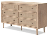 Signature Design by Ashley Cielden Coastal 6-Drawer Dresser, Bronze-Tone Knobs, Safety Stop, Textured Cane Details, 62.01" W x 19.65" D x 35.67" H, Light Brown Signature Design by Ashley
