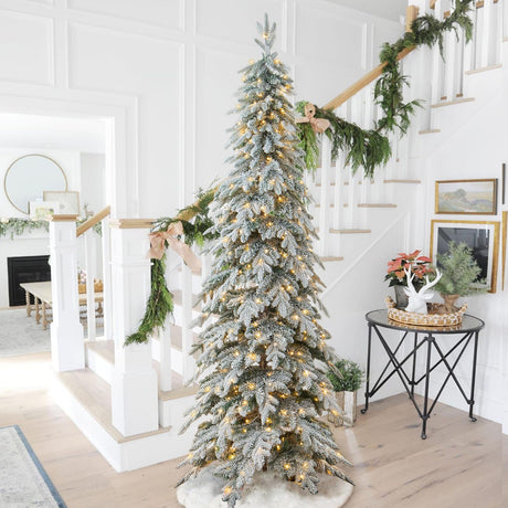 Glitzhome 9ft Pre-Lit Flocked Pencil Spruce Artificial Christmas Tree with 470 Warm White Lights and Sturdy Metal Stand for Home, Office, Party Decoration Glitzhome