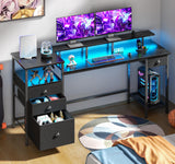 Furologee Black Computer Desk with 4 Drawers, 60" Long Office Desk with Fabric File Cabinet and Power Outlets, Gaming Desk with LED Lights, Study Writing Work Desk for Home Office Furologee