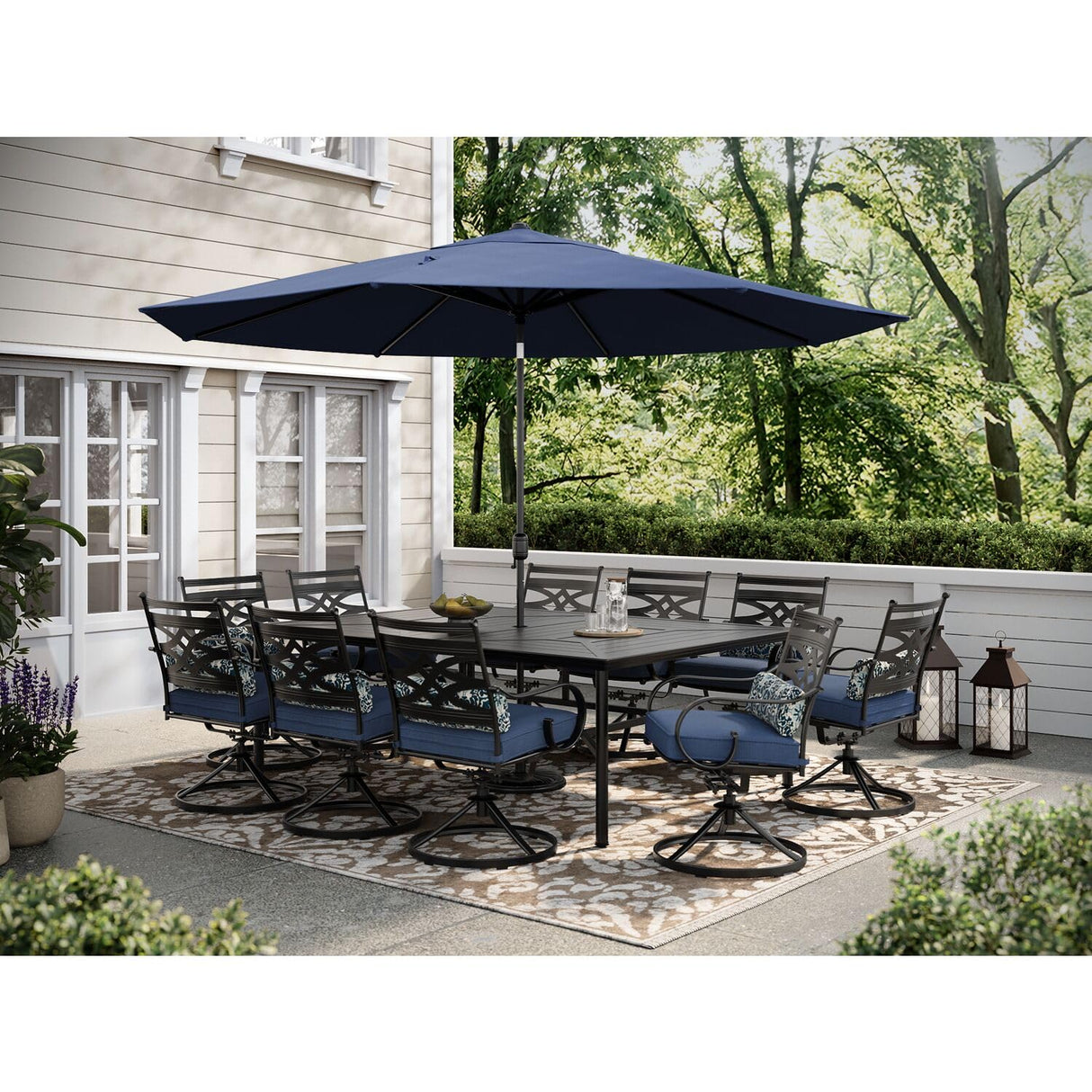 Hanover Montclair 11-Piece Outdoor Dining Set, All-Weather Outdoor Patio Dining Set, 10 Swivel Rocker Chairs with Seat and Lumbar Cushions, 84"x60" Stamped Rectangle Table, Umbrella, and Umbrella Base Hanover