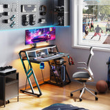 MOTPK Gaming Desk with Power Outlet & LED Lights, Gaming Computer Desk 39inch with PC Storage Shelf, Gaming Table with Carbon Fiber Texture, Gamer Desk, Gift for Boys Men, Black MOTPK