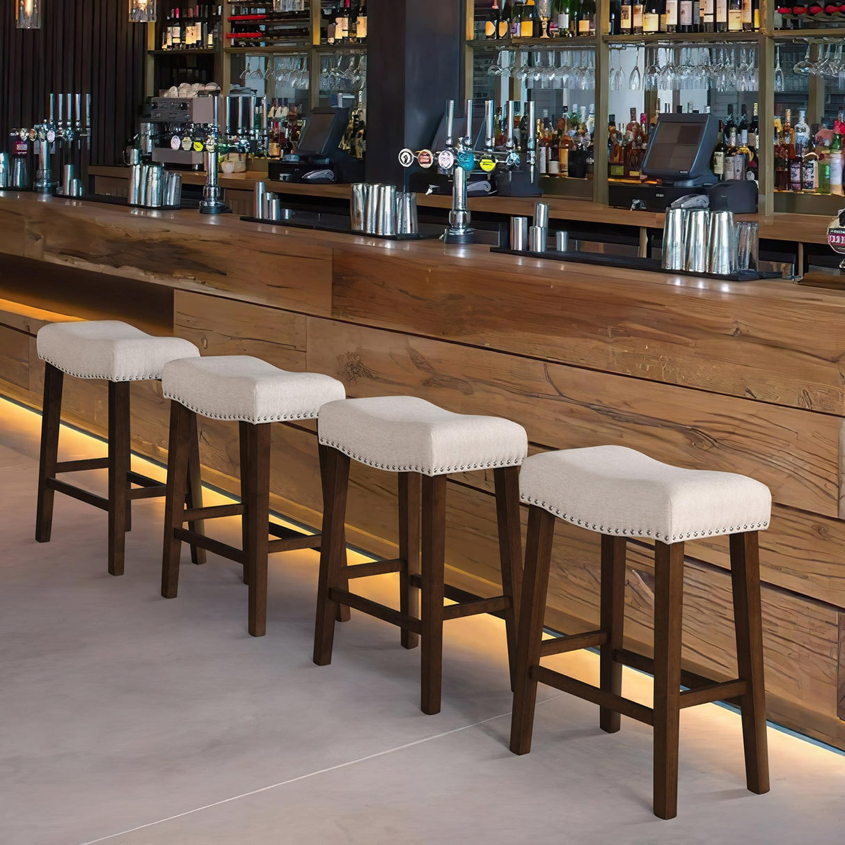 Larksperal 26" Counter Height Bar Stools - Modern Backless Kitchen Island Saddle Barstools Chairs with Footrest, Solid Wood Legs & Nailhead Trim Linen Fabric Cushion, Beige, Set of 4 Larksperal