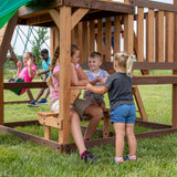Backyard Discovery Highlander All Cedar Wooden Swing Set, 3 Levels, Step Ladder, Snack Bar with Bench, Sandbox, 2 Belt Swings, Web Swing, 10ft Wave Slide, Rock Wall, Backyard Discovery