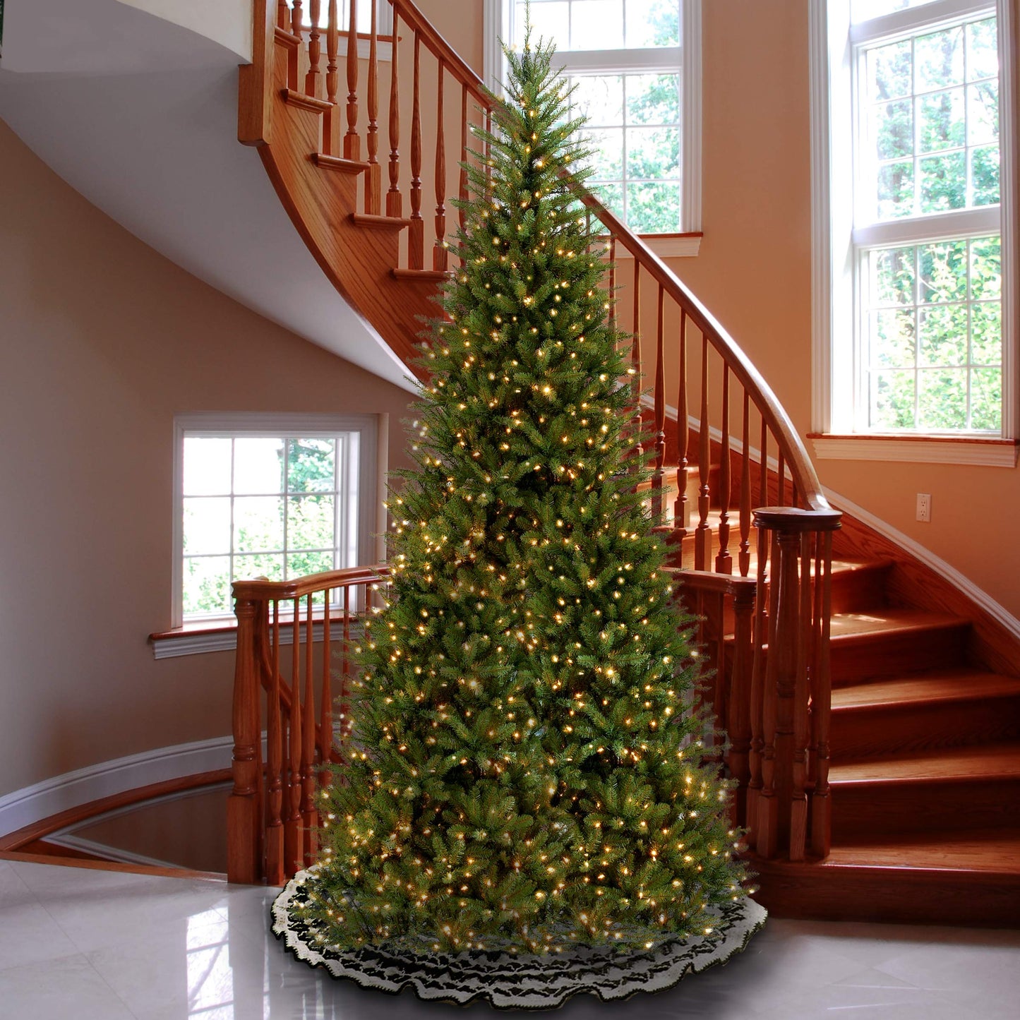 National Tree Company Pre-Lit Artificial Slim Christmas Tree, Green, Dunhill Fir, White Lights, Includes Stand, 12 Feet