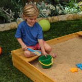 KidKraft Wooden Backyard Sandbox with Built-in Corner Seating and Mesh Cover, Kid's Outdoor Furniture, Honey, Gift for Ages 2-8 KidKraft