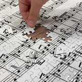 Ambesonne Music Jigsaw Puzzle for Adults, Musical Notes on The Clef Illustration Ornamental Pattern Art Print, Heirloom-Quality Fun Activity Durable Cardboard, 1000 pcs, White Ambesonne
