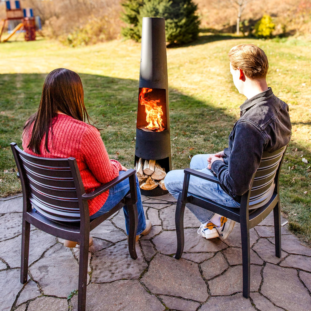 Sunnydaze 59" H Steel Outdoor Chiminea Fire Pit with Built-in Log Holder - Metal Fireplace with Chimney - Includes Poker Sunnydaze