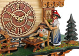 Trenkle Quartz Cuckoo Clock Black Forest House with Moving Black Forest Woman and Mill Wheel, with Music TU 4215 QM Trenkle