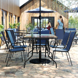 Flash Furniture Brazos 7 Piece Outdoor Patio Dining Set - 6 Navy Flex Comfort Stack Chairs - 55" Tempered Glass Patio Table with Umbrella Hole Flash Furniture