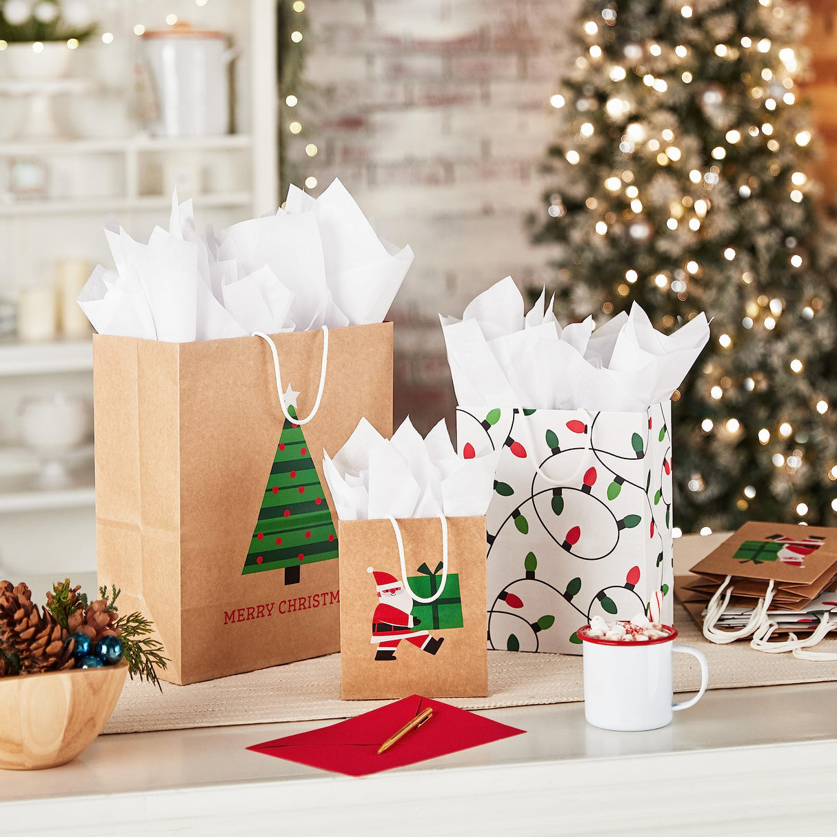 Hallmark Christmas Gift Bags for Kids (8 Bags: 3 Small 6", 3 Medium 9", 2 Large 13") Recyclable Kraft with Santa, Lights and Tree Hallmark