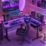 FEZIBO 63" Triple Motor L Shaped Standing Desk with LED Strip & Power Outlets, Height Adjustable Stand up Corner Gaming Desk with Ergonomic Monitor Stand, Black Carbon Fiber Top/Black Frame FEZIBO
